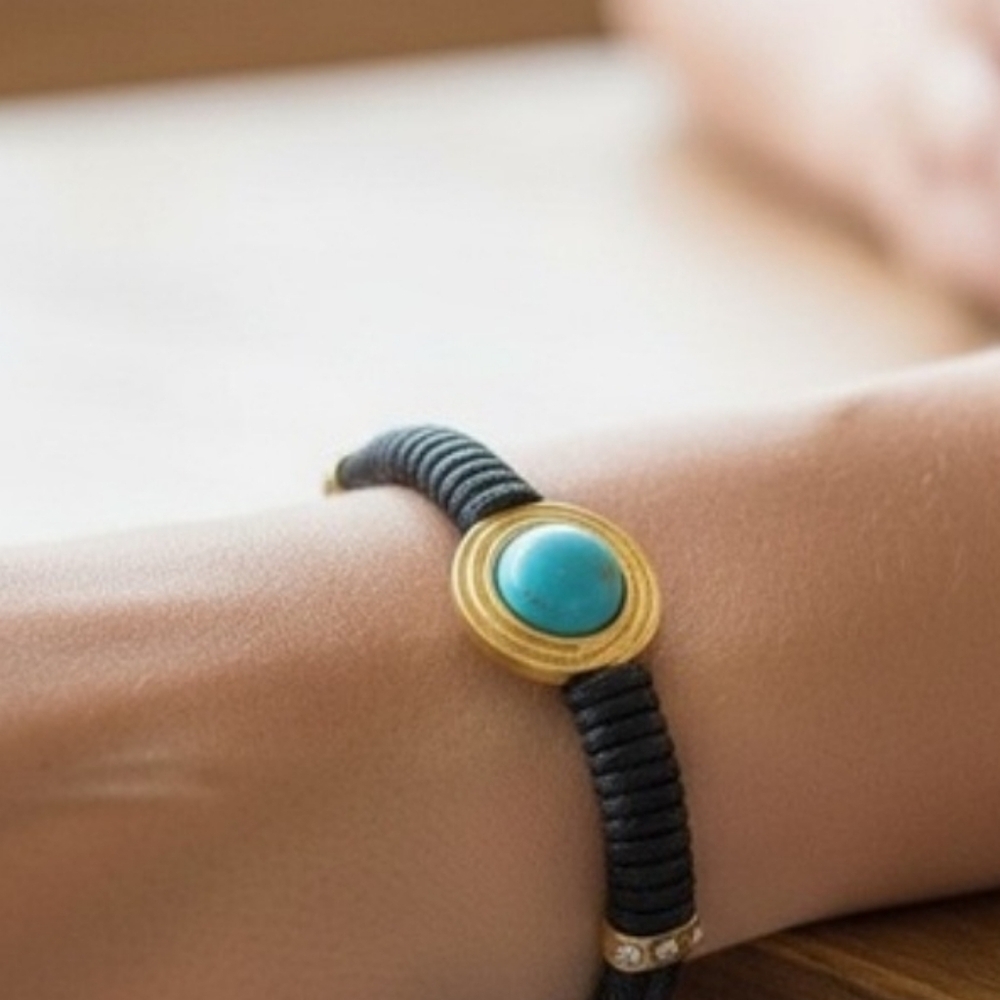 Elegant Black and Gold Bracelet with Turquoise Accent